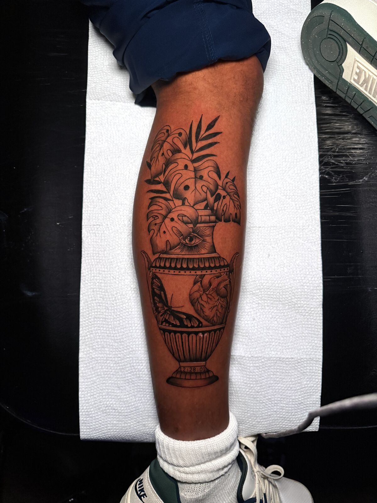 Florals in an urn on a calf